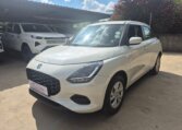 White 2025 Suzuki Swift, front three-quarter view