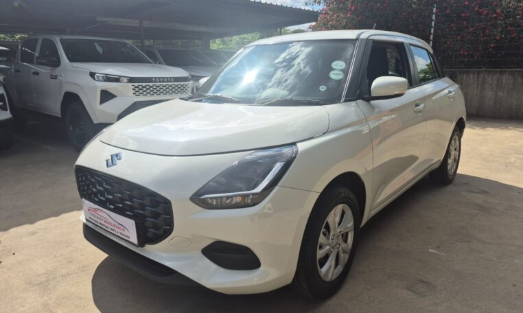 White 2025 Suzuki Swift, front three-quarter view