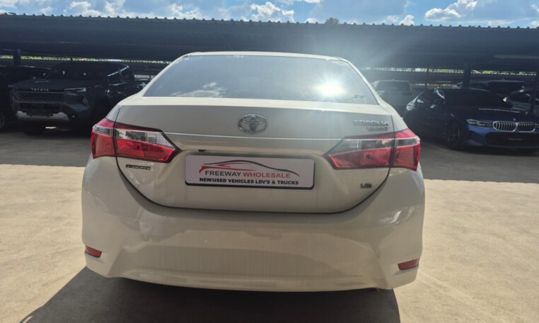 White 2025 Toyota Corolla Quest Exclusive, rear view