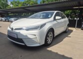 White 2025 Toyota Corolla Quest Exclusive, opposite front three-quarter view