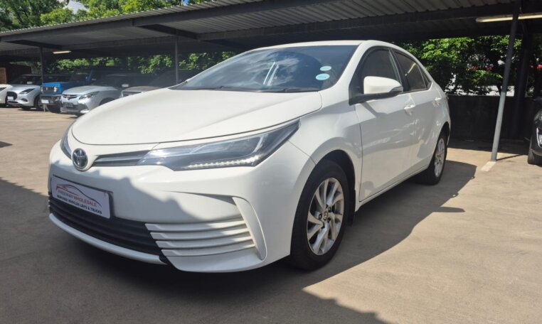 White 2025 Toyota Corolla Quest Exclusive, opposite front three-quarter view