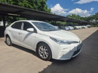 White 2025 Toyota Corolla Quest Exclusive, front three-quarter view