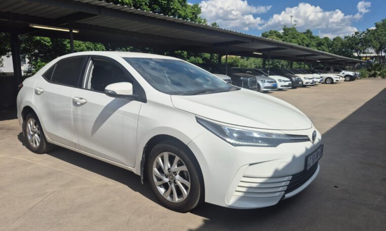 White 2025 Toyota Corolla Quest Exclusive, front three-quarter view
