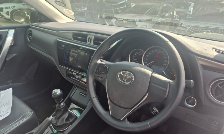 White 2025 Toyota Corolla Quest Exclusive, interior and manual gear lever