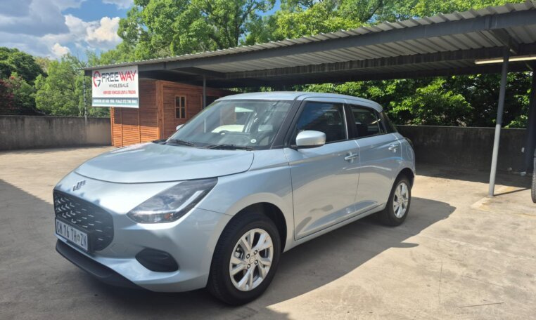 Silver 2025 Suzuki Swift, opposite front three-quarter view