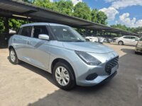 Silver 2025 Suzuki Swift, front three-quarter view
