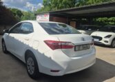 White 2024 Toyota Corolla Quest, rear three-quarter view
