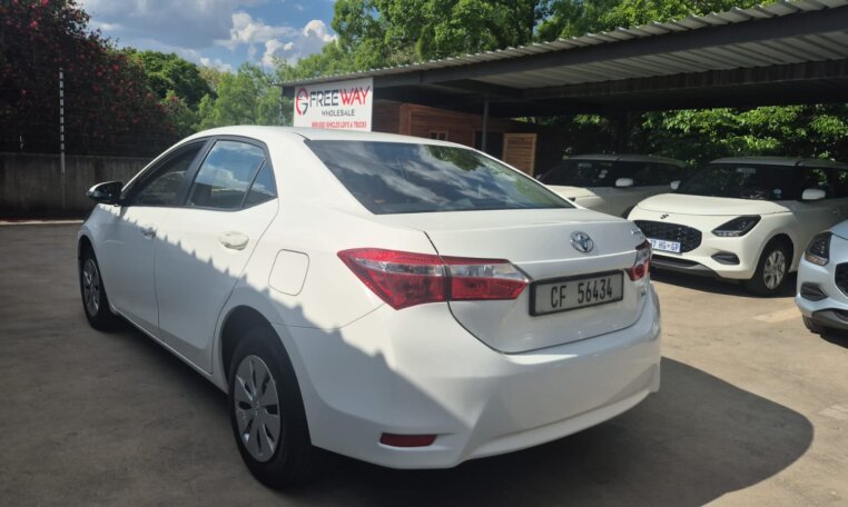 White 2024 Toyota Corolla Quest, rear three-quarter view